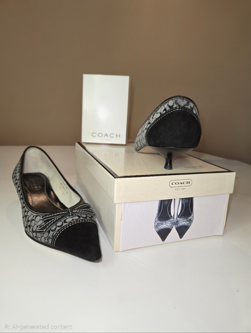 Coach Black and Gray Signature Pointed Toe Kitten Heels
